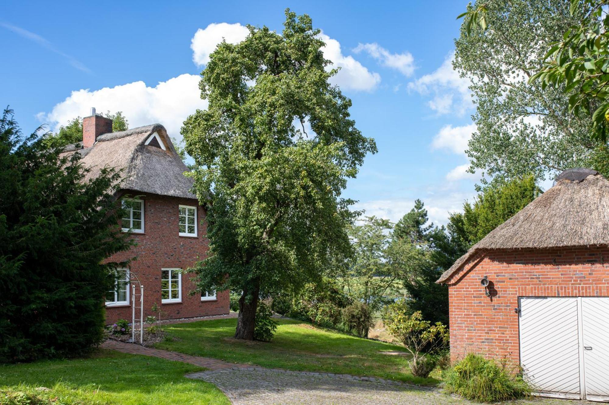 Reetdachhaus Eiderblick Villa Breiholz ภายนอก รูปภาพ